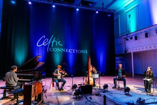 Musicians performing on stage at Celtic Connections festival