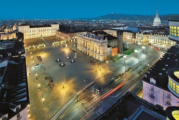 Piazza Castello, an aerial shot of grand city square at dusk in Torino.