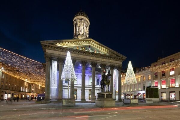 The Gallery of Modern Art sits between two canopies of fairy lights which reach out across Royal Exchange Square.