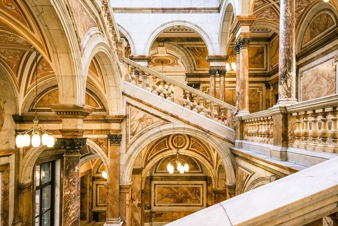 A grand, marble staircase inside the City Chambers in Glasgow.